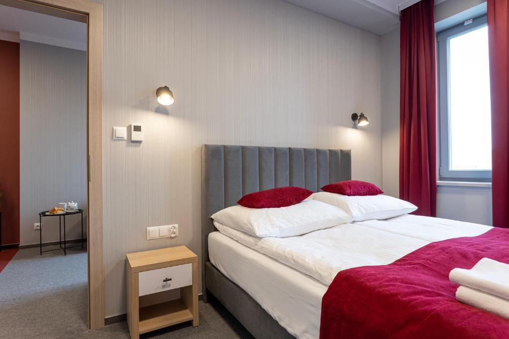 Postel nebo postele na pokoji v ubytování Apartamenty Albatros