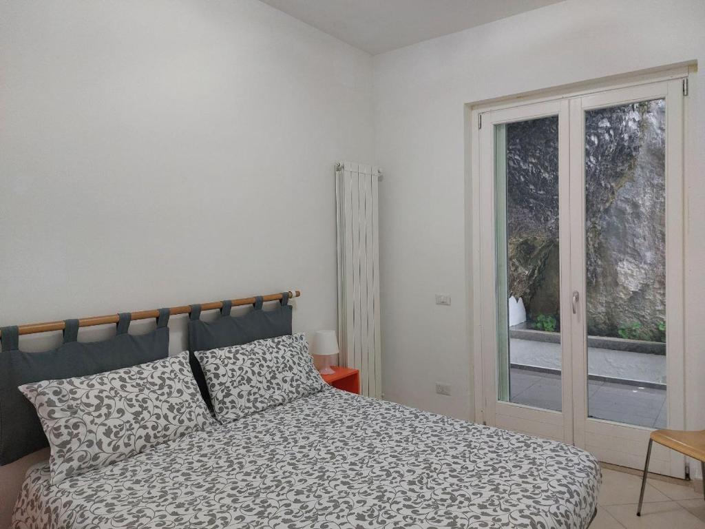 Posteľ alebo postele v izbe v ubytovaní Adagio Ravello