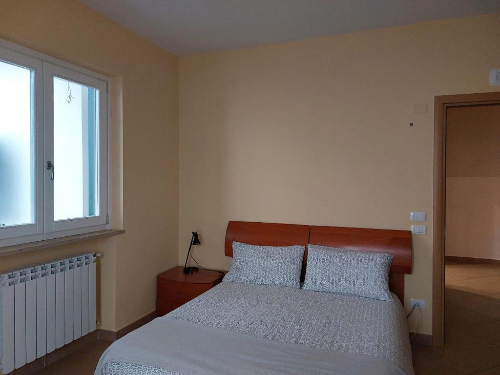 Posteľ alebo postele v izbe v ubytovaní Adagio Ravello