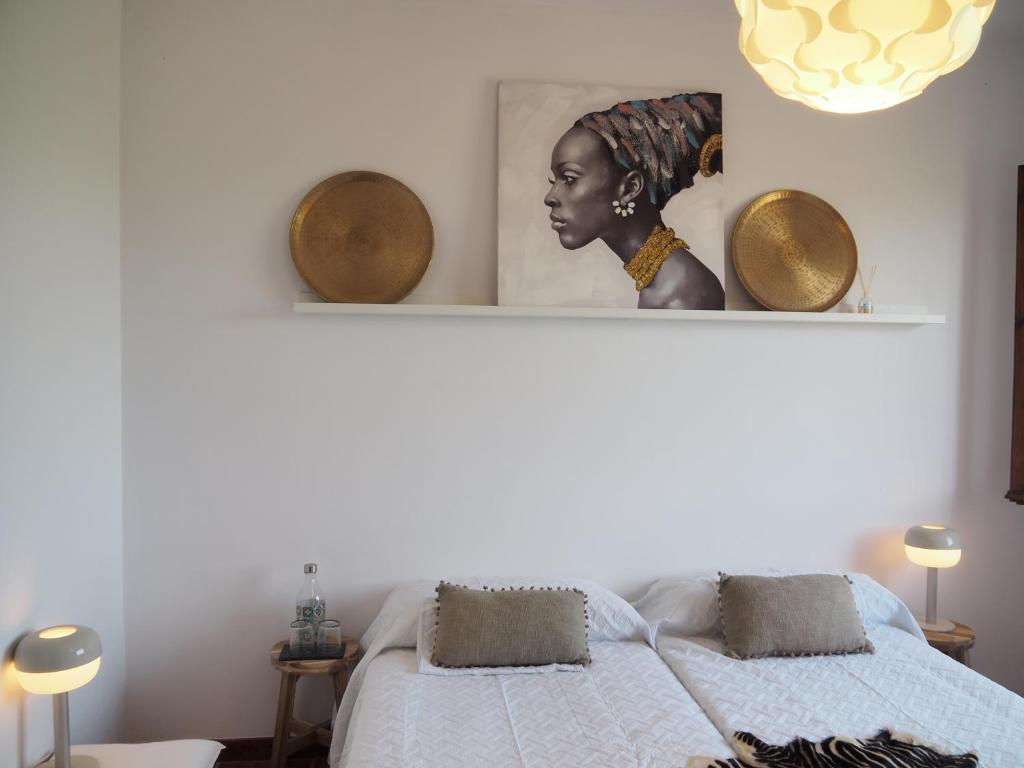 Postel nebo postele na pokoji v ubytování Le Mirage