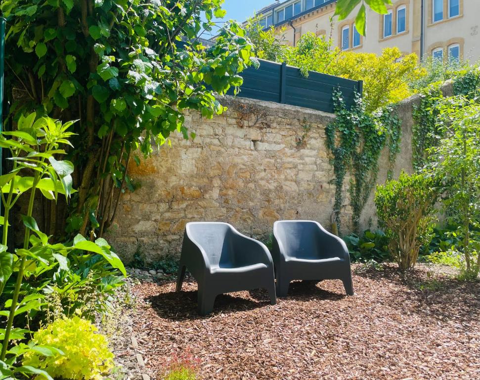 Vonkajšia záhrada v ubytovaní Hédoné Suite de luxe et Spa privatif