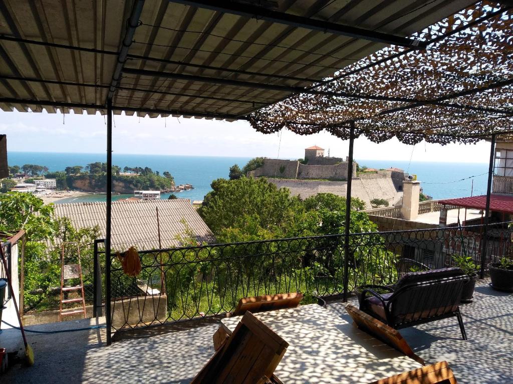 a patio with a view of the ocean from a house at Sea View Apartment Ulcinj 80 m² in Ulcinj