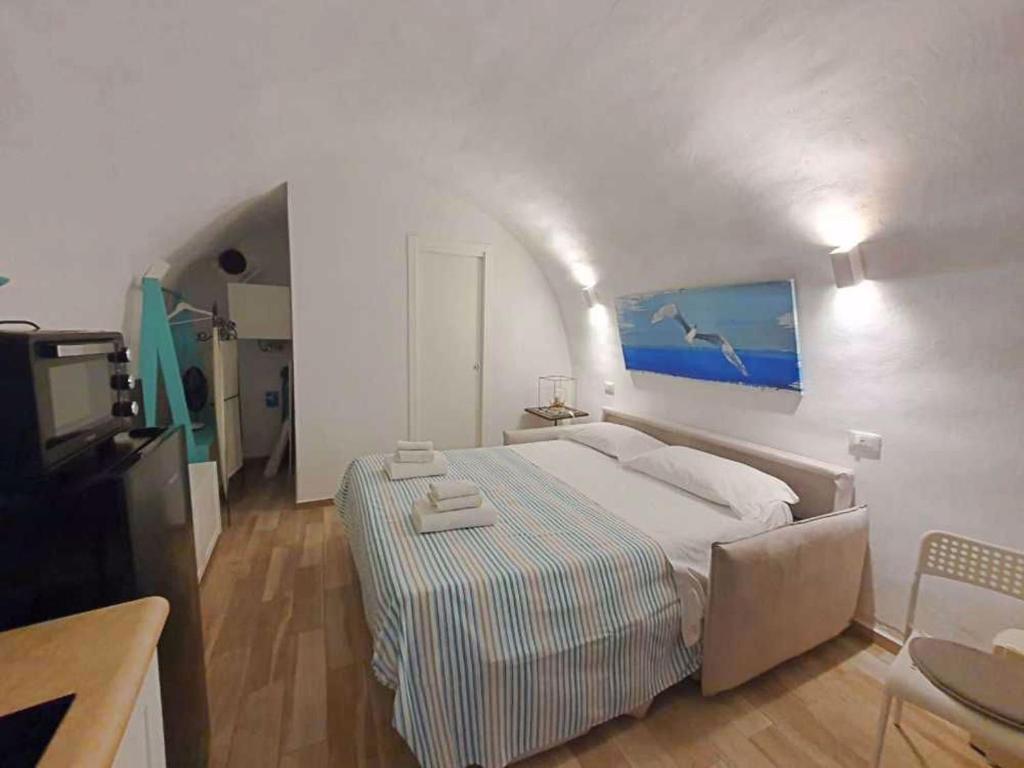 Postel nebo postele na pokoji v ubytování Ammiraglio Giglio Castello