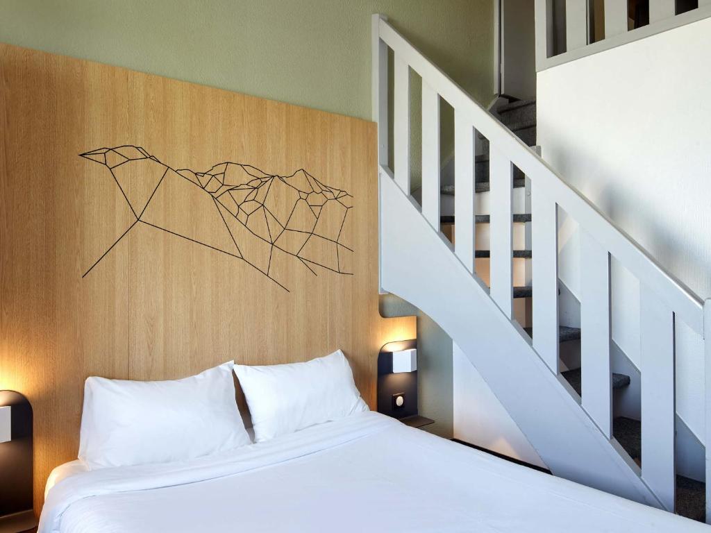 Postel nebo postele na pokoji v ubytování B&B HOTEL Paris Roissy CDG Aéroport