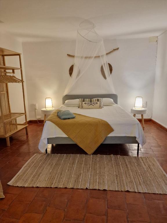 Postel nebo postele na pokoji v ubytování Mongofre Agroturismo