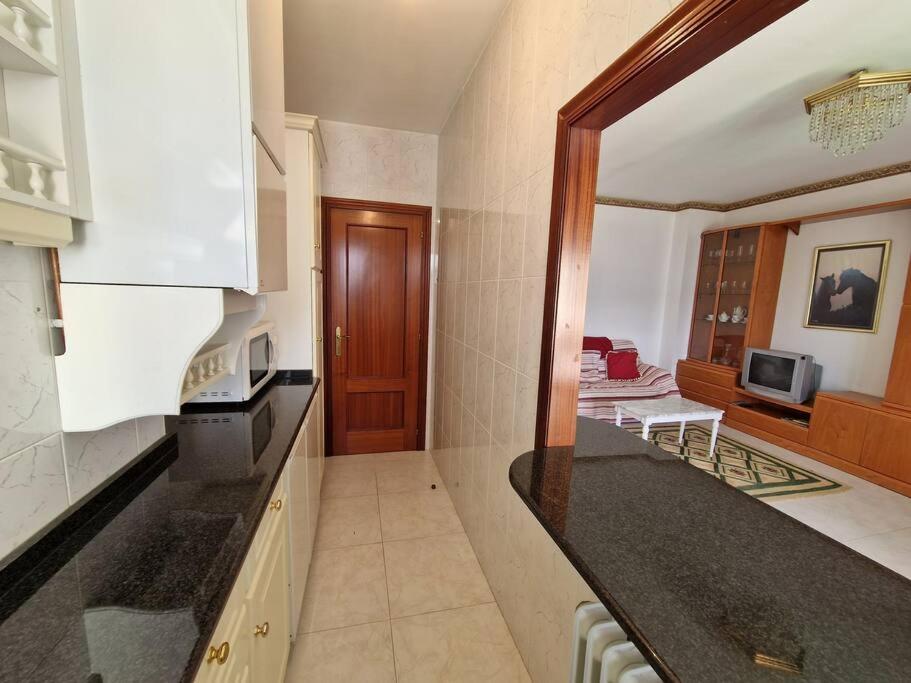 Kuchyň nebo kuchyňský kout v ubytování Precioso apartamento con piscina - Covelo