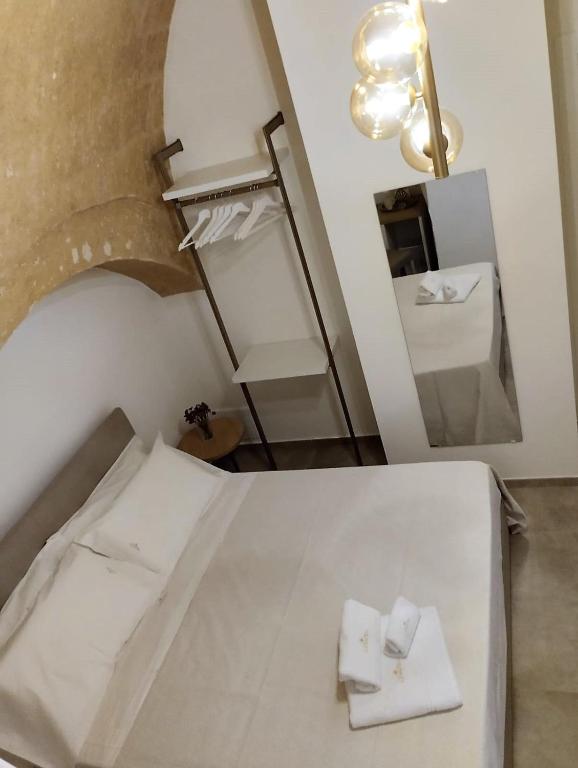 Postel nebo postele na pokoji v ubytování CASATA
