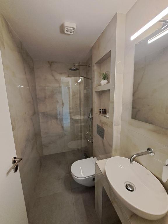 Łazienka w obiekcie Hotel Tassos-Despina