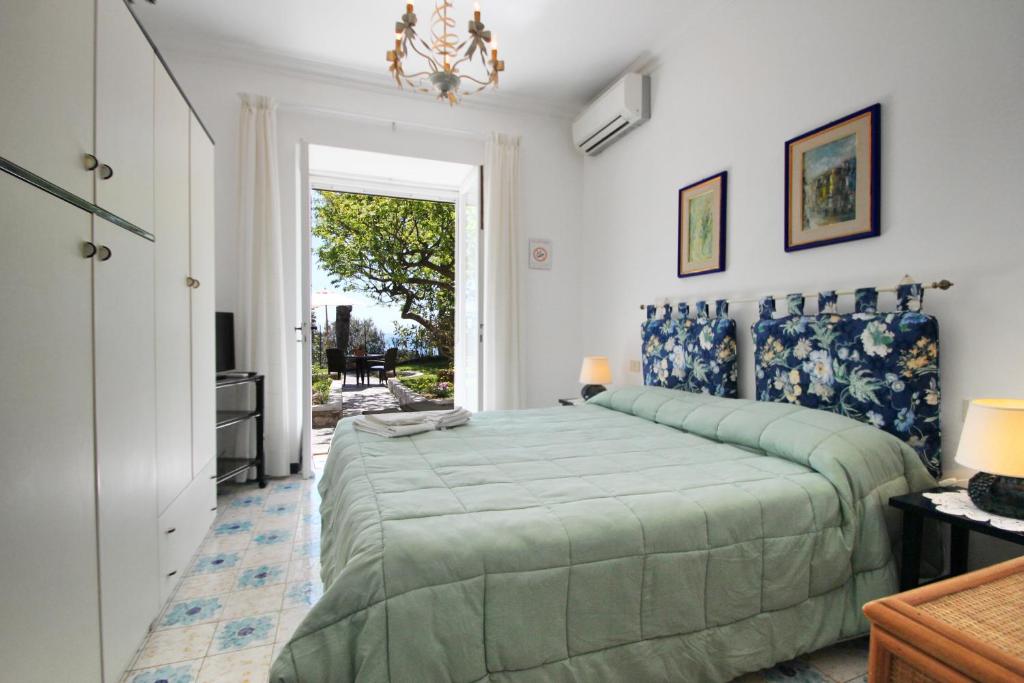 Postel nebo postele na pokoji v ubytování Casa Augusto B&B