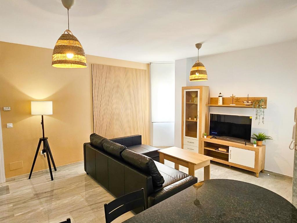 TV a/nebo společenská místnost v ubytování Yeti Ático Beach - Alojamientos La Torre