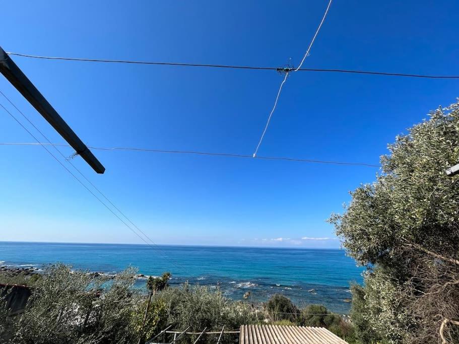 a view of the ocean from a power line at Elia’s house in Ligia