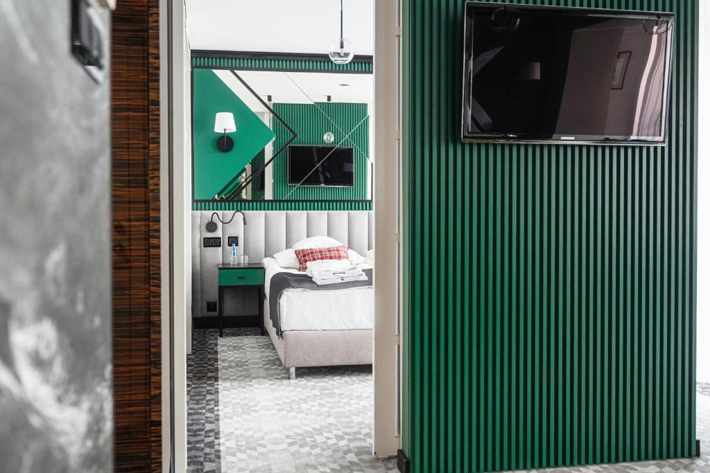 TV/Unterhaltungsangebot in der Unterkunft Rysy Boutique Hotel
