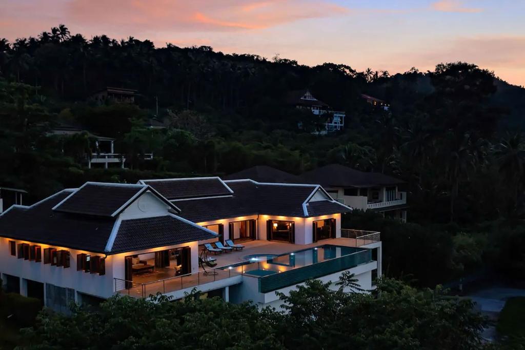 an aerial view of a house at sunset at Villa E in Taling Ngam Beach