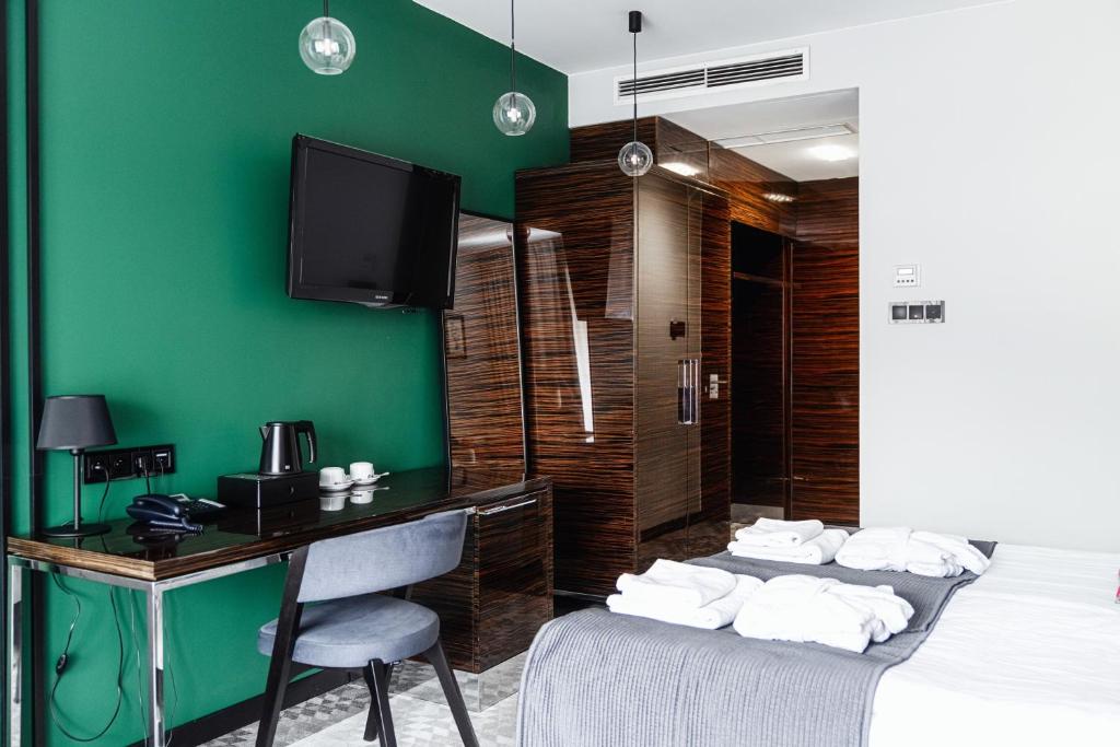 TV/Unterhaltungsangebot in der Unterkunft Rysy Boutique Hotel