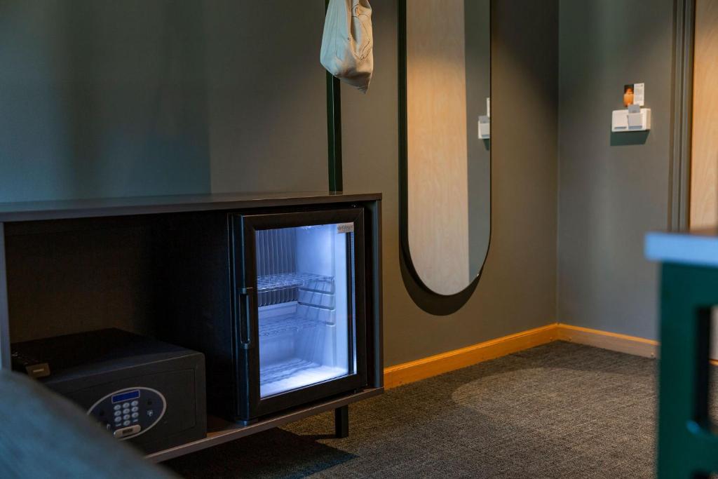 TV a/nebo společenská místnost v ubytování Spar Hotel Gårda