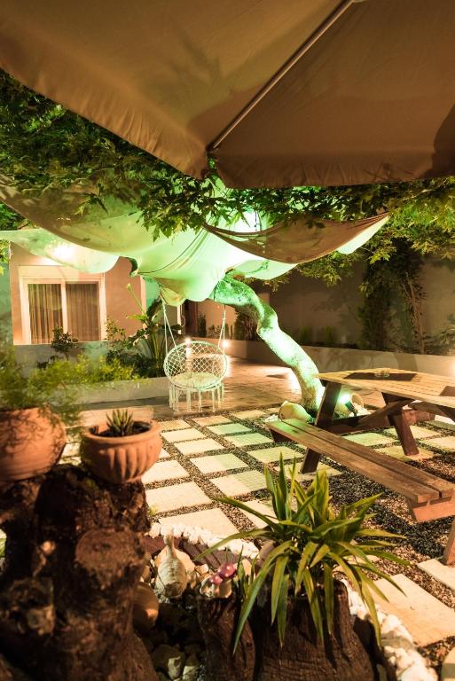 A garden outside The 50/50 Luxury Apartments