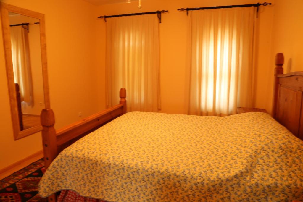 A bed or beds in a room at Villa Emel