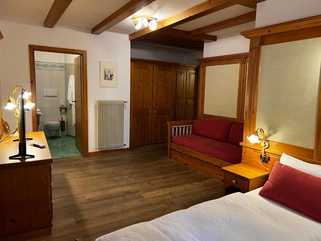 Postel nebo postele na pokoji v ubytování KAISERKRONE CHARMING RETREAT