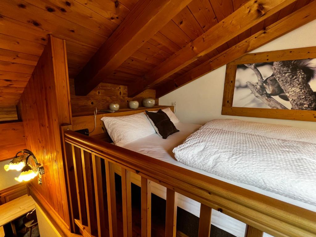 Postel nebo postele na pokoji v ubytování KAISERKRONE CHARMING RETREAT