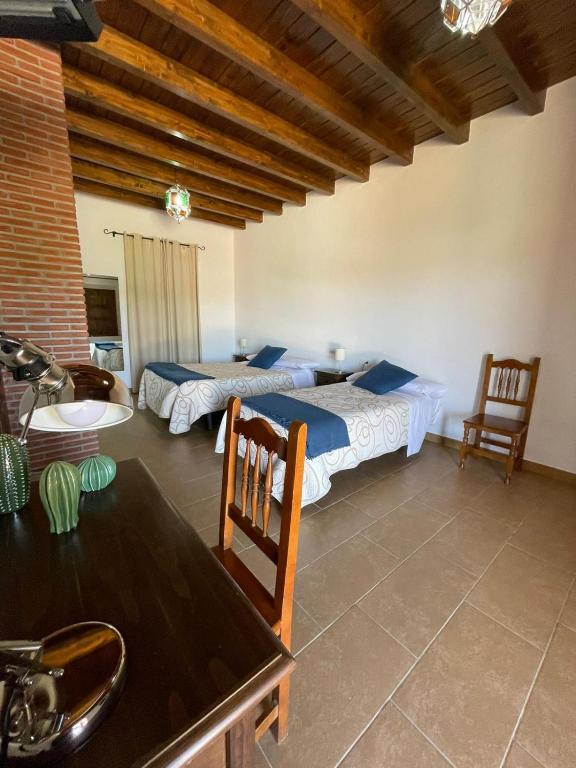 Posteľ alebo postele v izbe v ubytovaní Habitación rural en Posada Los Caballos