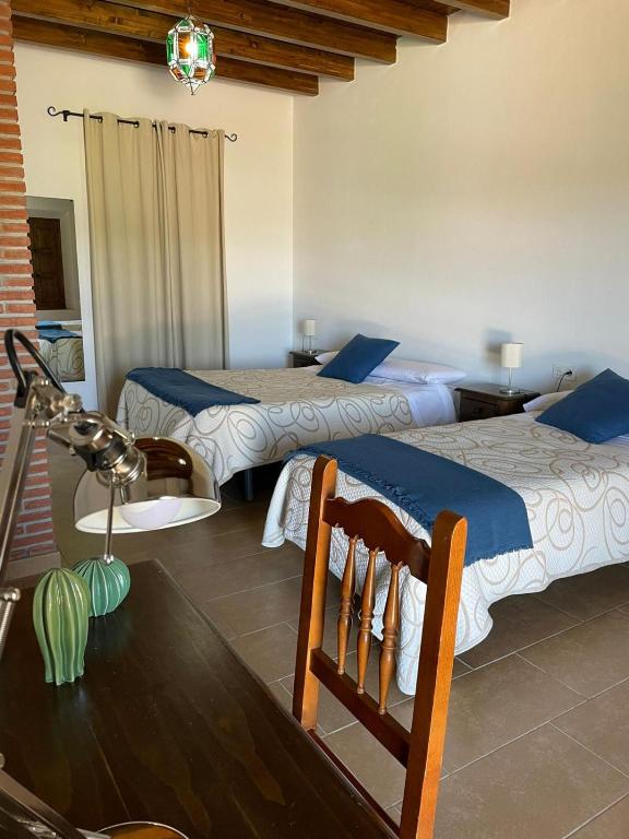 Posteľ alebo postele v izbe v ubytovaní Habitación rural en Posada Los Caballos