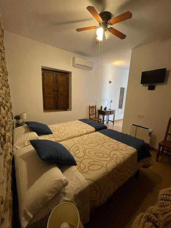 Posteľ alebo postele v izbe v ubytovaní Habitación rural en Posada Los Caballos