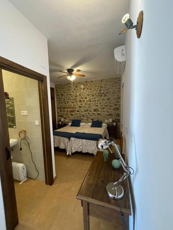 Posteľ alebo postele v izbe v ubytovaní Habitación rural en Posada Los Caballos