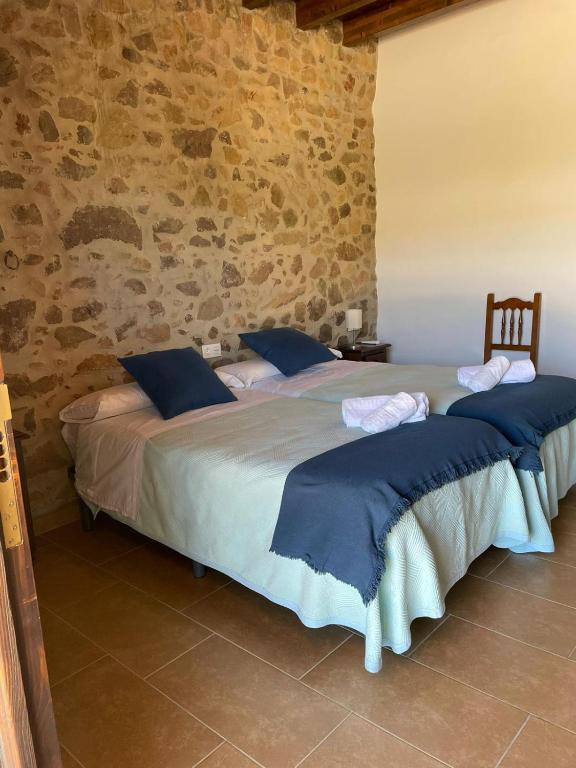 Posteľ alebo postele v izbe v ubytovaní Habitación rural en Posada Los Caballos