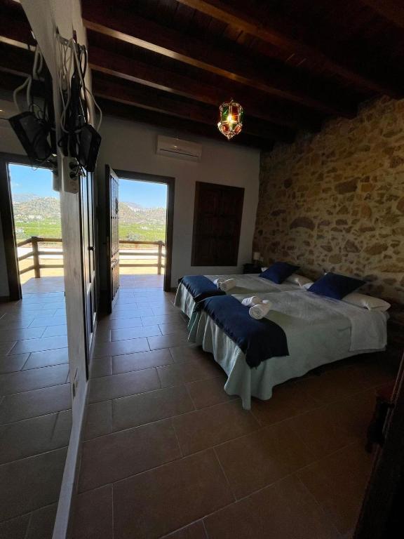 Posteľ alebo postele v izbe v ubytovaní Habitación rural en Posada Los Caballos
