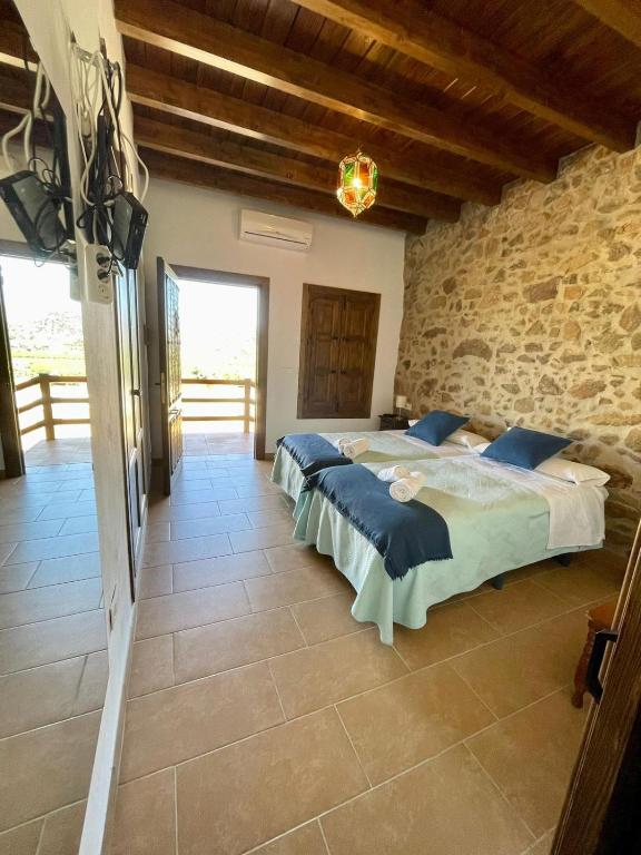 Posteľ alebo postele v izbe v ubytovaní Habitación rural en Posada Los Caballos