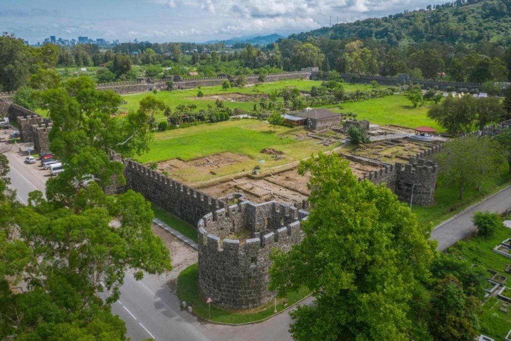 an aerial view of a castle with trees at Europalace Gonio in Gonio