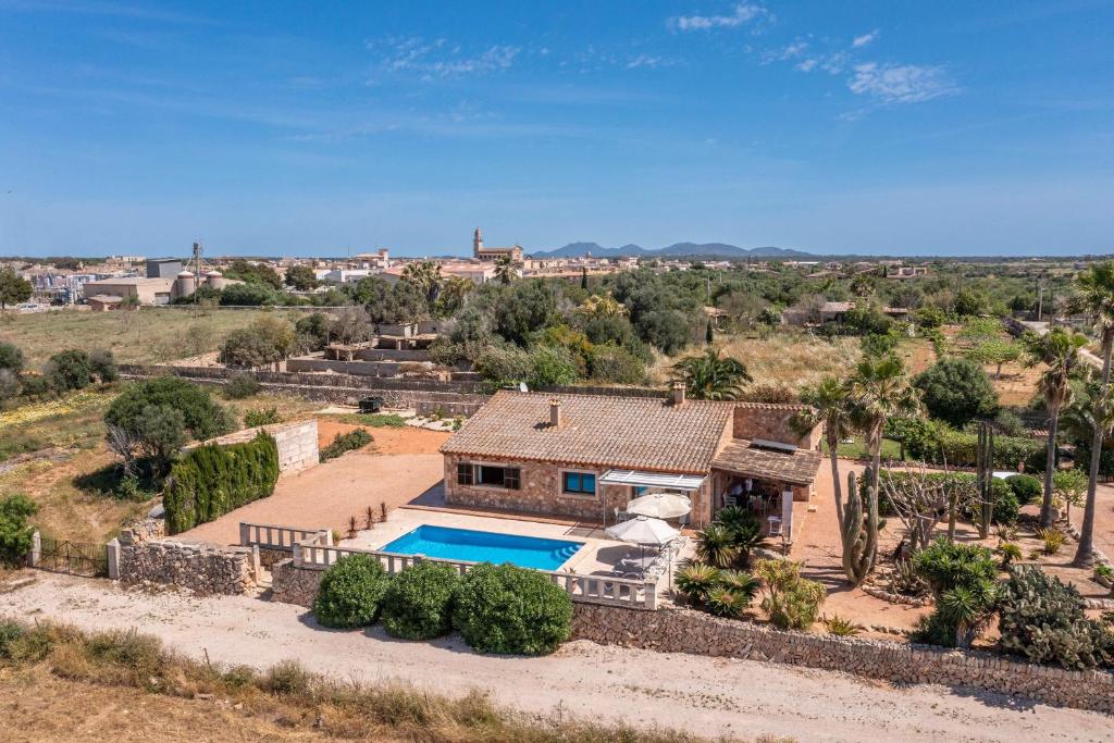 an aerial view of a house with a swimming pool at Sa Marina des torrent - Grupo Berna in Ses Salines