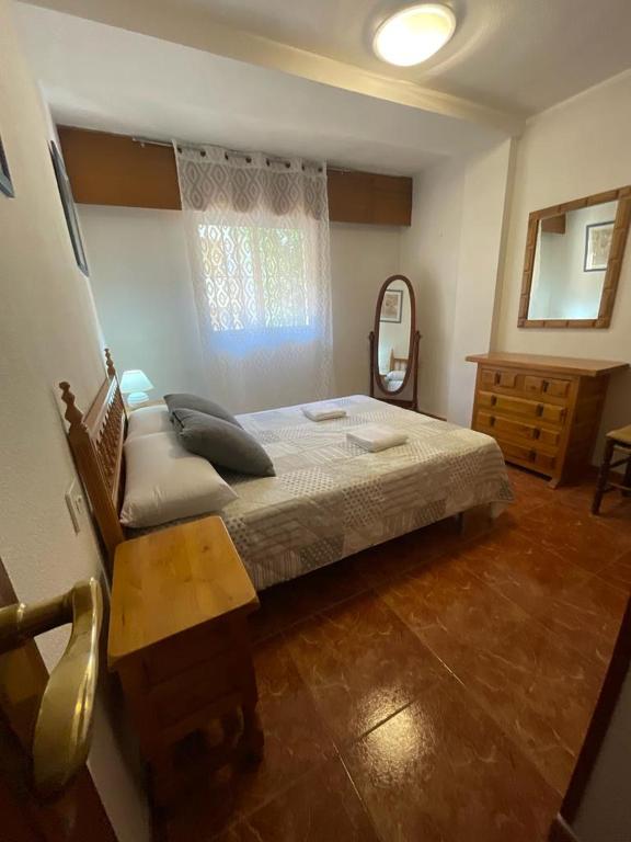 Posteľ alebo postele v izbe v ubytovaní Apartamento Rivas