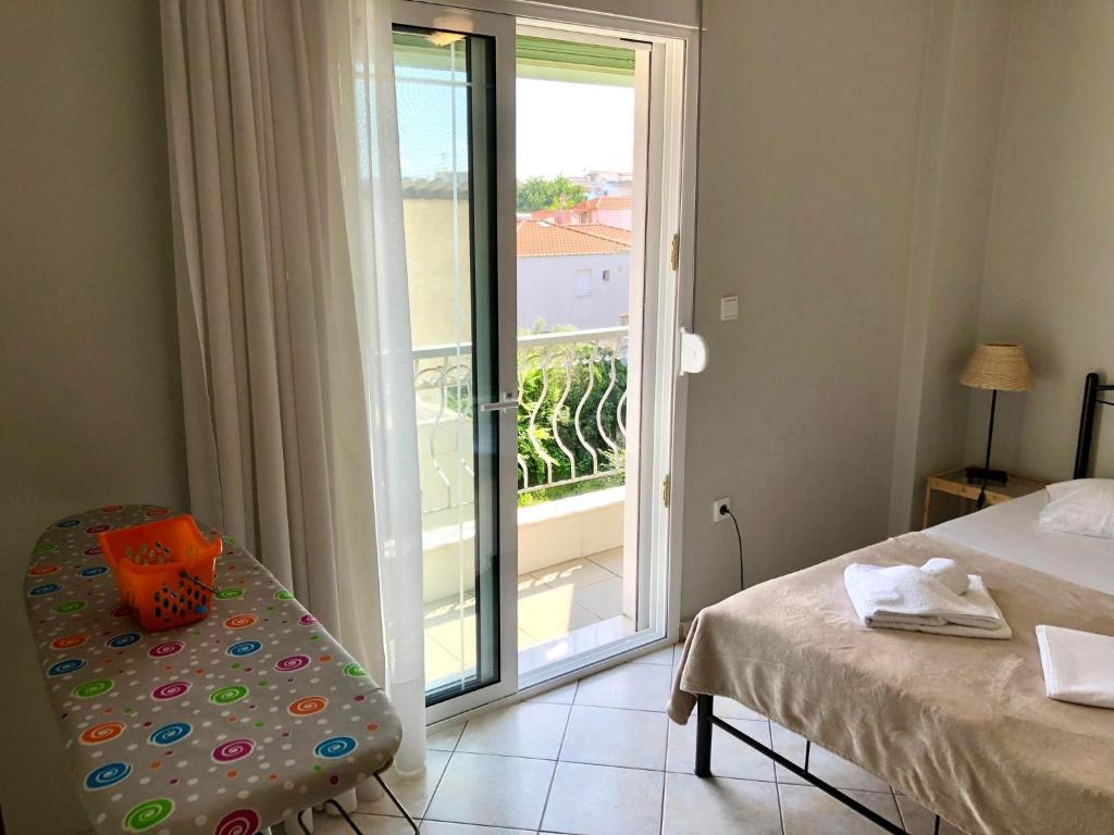 Postel nebo postele na pokoji v ubytování Mina Apartments 3 Nea Kallikrateia