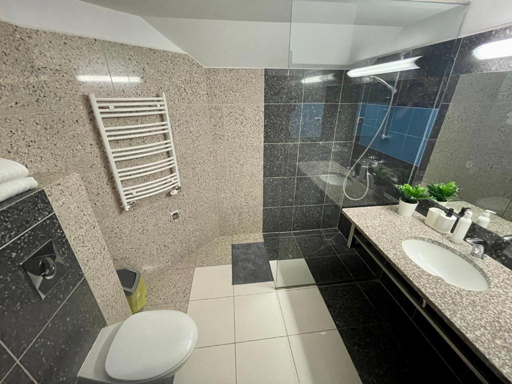 Koupelna v ubytování Apartamenty Residence Borkowo