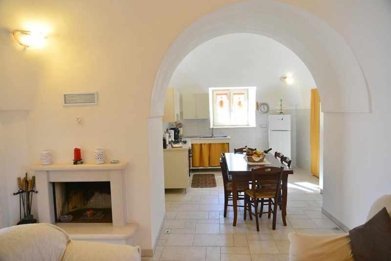 A seating area at Trullo Antico with exclusive swimming pool