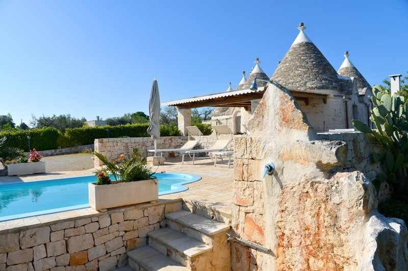 The swimming pool at or close to Trullo Antico with exclusive swimming pool