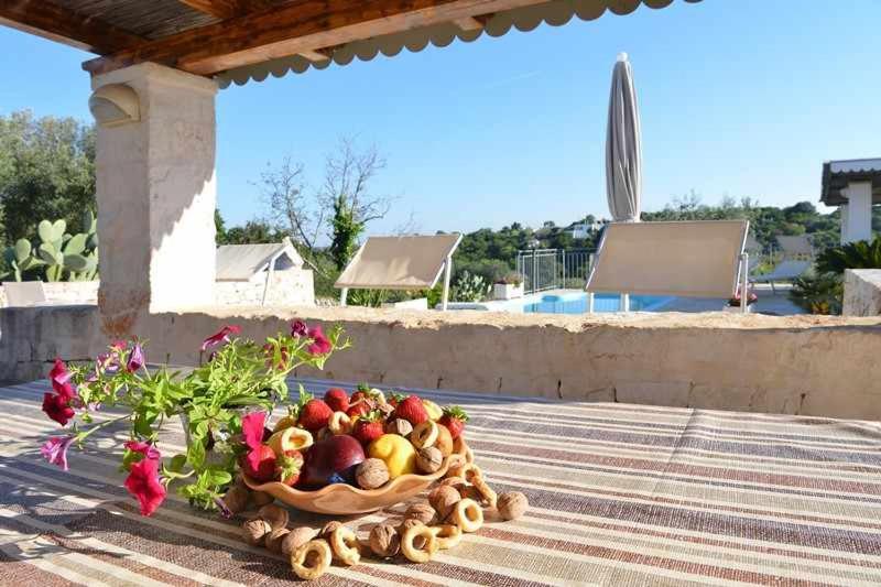 The swimming pool at or close to Trullo Antico with exclusive swimming pool