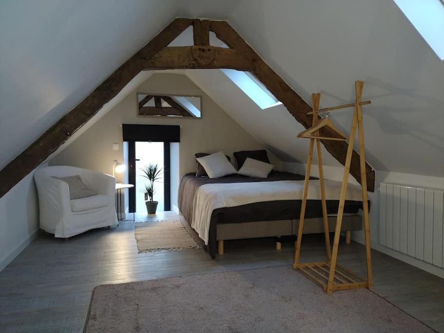 Postel nebo postele na pokoji v ubytování Gîte charmant typique Breton Ti Quartier