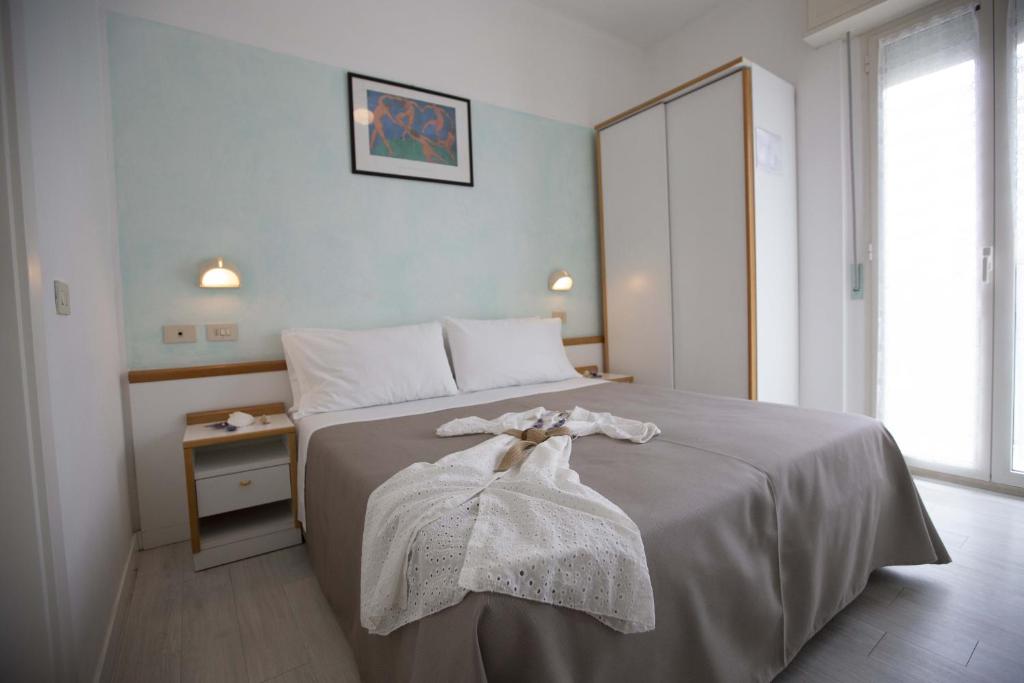 Postel nebo postele na pokoji v ubytování Hotel Eden B&B