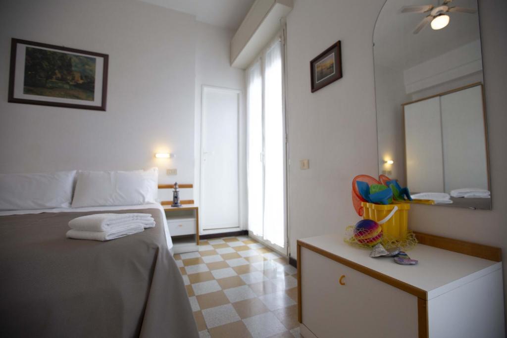 Postel nebo postele na pokoji v ubytování Hotel Eden B&B