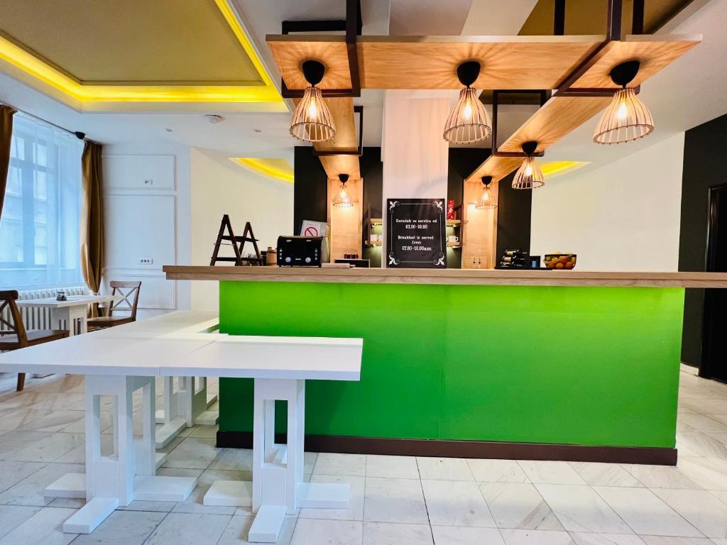 Kuchyň nebo kuchyňský kout v ubytování Side One Design Hotel Garni