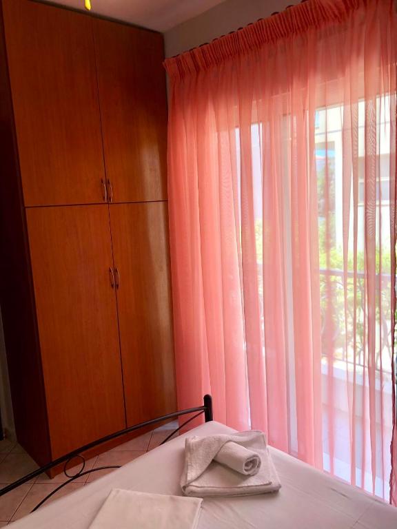 Postel nebo postele na pokoji v ubytování Mina Apartments 4 Nea Kallikrateia