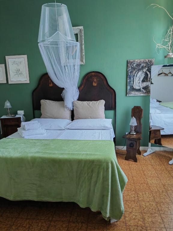 A bed or beds in a room at B&B LaMaGia di Corte Moronati