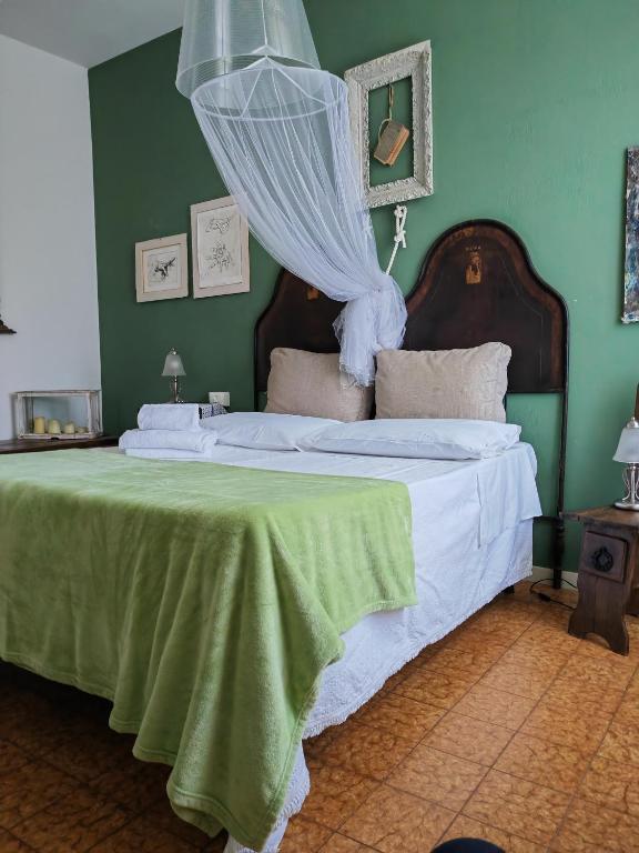A bed or beds in a room at B&B LaMaGia di Corte Moronati