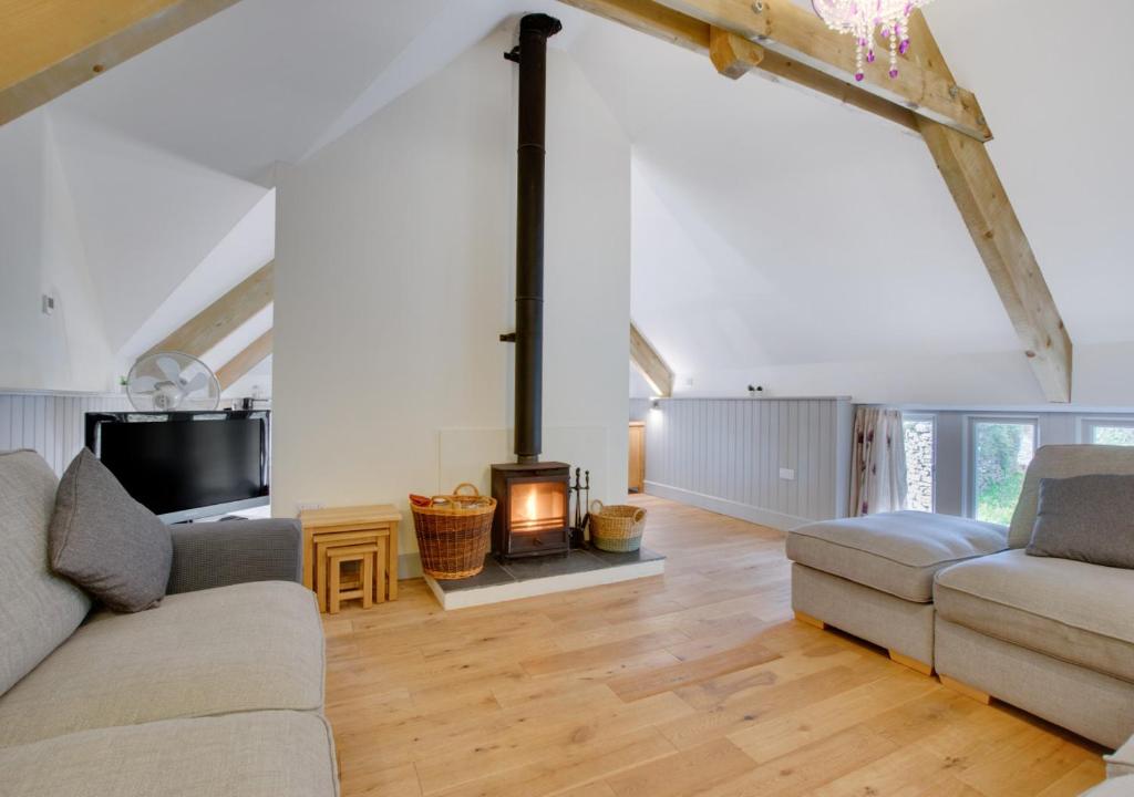 Posezení v ubytování Plym Cottage