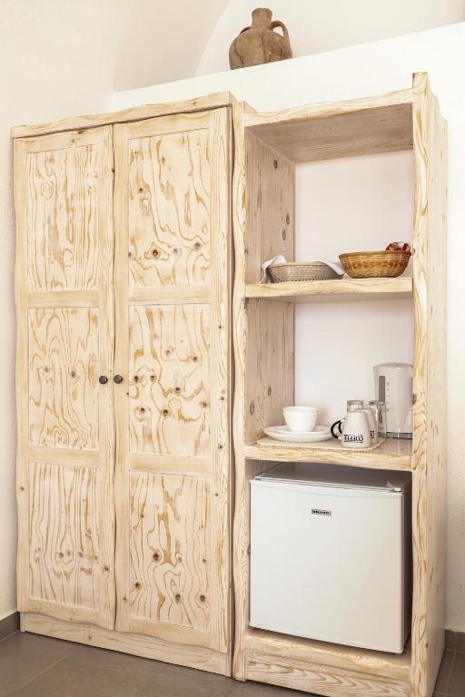 A kitchen or kitchenette at Caldera Butterfly Villas