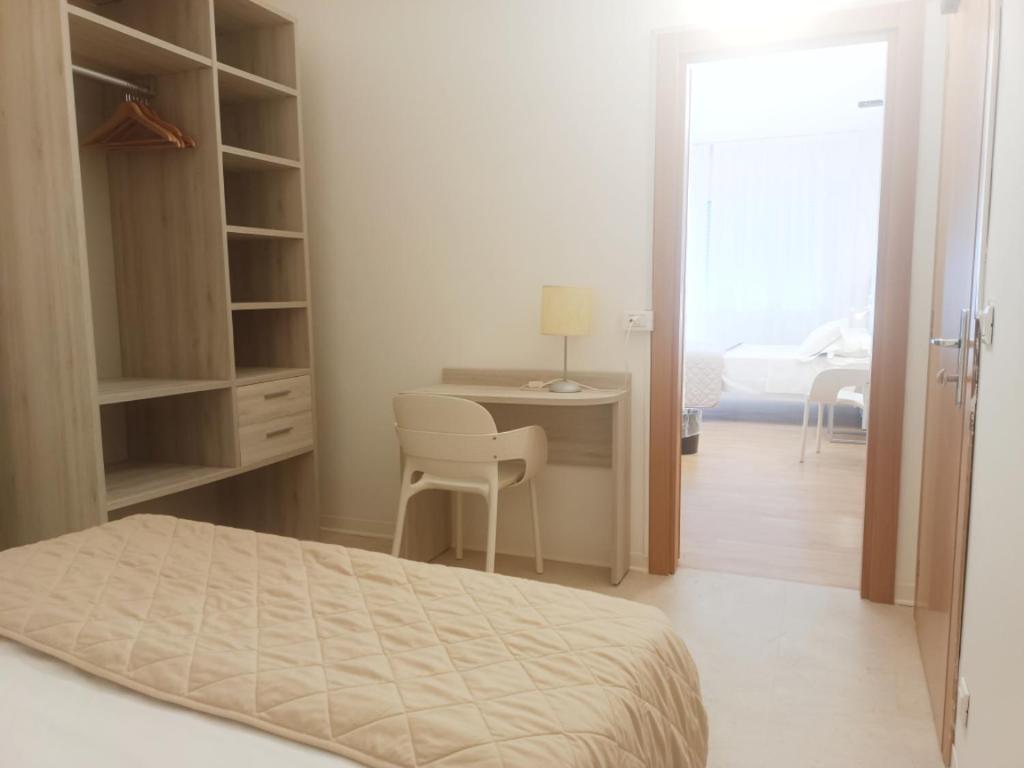 Postel nebo postele na pokoji v ubytování Hotel Splendid