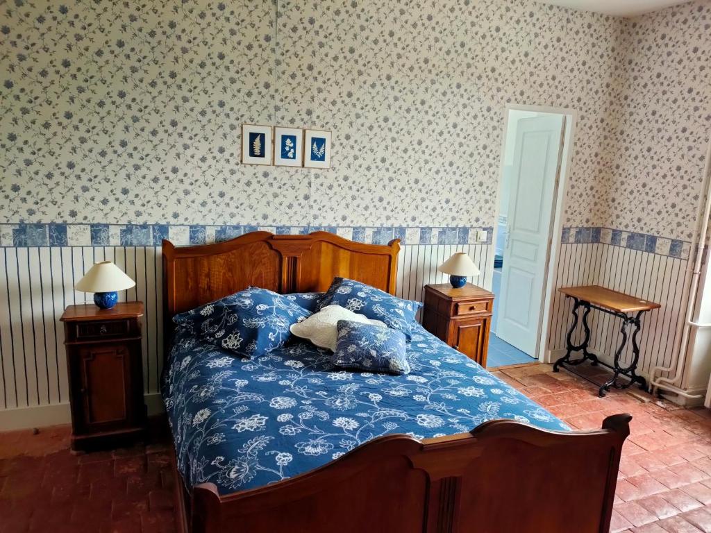 Postel nebo postele na pokoji v ubytování La ferme des douceurs