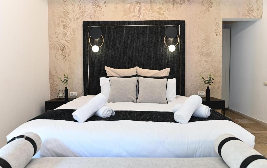 Postel nebo postele na pokoji v ubytování YalaRent - Liri Resort